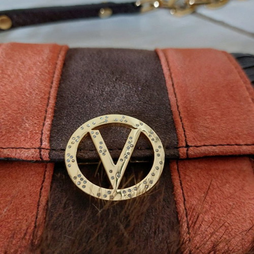 Handbag new with synthetic brown fur and croco print