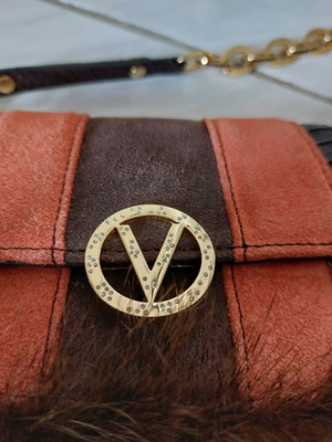 Handbag new with synthetic brown fur and croco print
