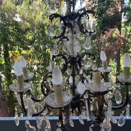 Antique chandelier used with bronze and crystal