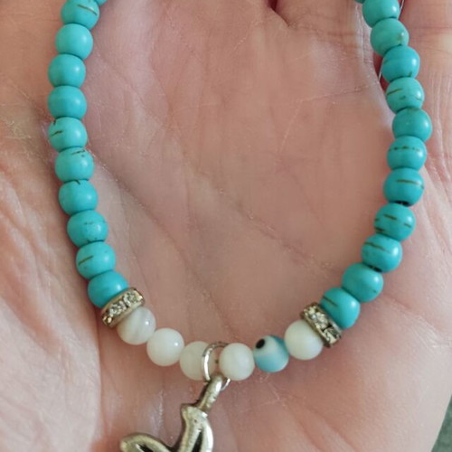 Bracelet with turquoise and white beads, silver details, new