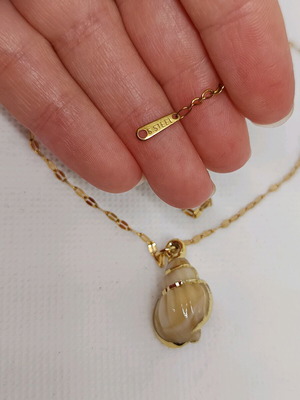 Shell necklace made of stainless steel like new, beige and gold