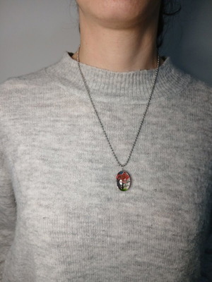 Necklace with pendant featuring tree and flowers, new