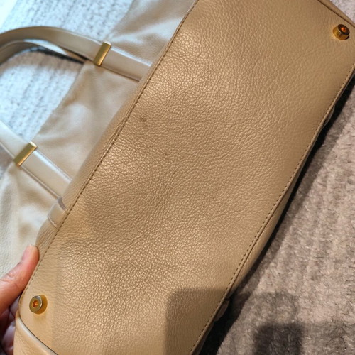 Coccinelle leather handbag beige like new