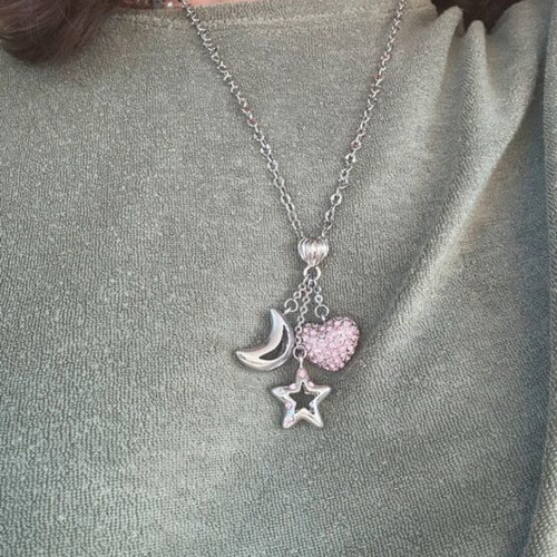 Silver necklace like new with three pendants heart, star and moon