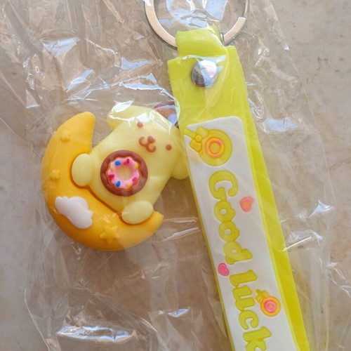 Good Luck keychain new, yellow