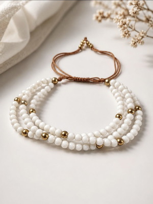 Triple bracelet with white beads and gold details new