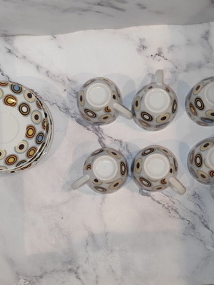 Coffee cup set with 6 cups and 5 saucers, like new