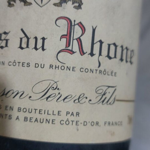 Côtes du Rhône 1997 wine bottle, sealed