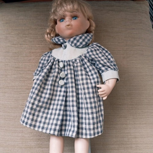 Porcelain doll used with stand, 33 cm tall