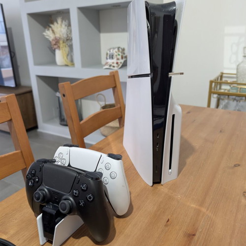 Sony PS5 Disk Edition console with 2 controllers, headphones, 5 games