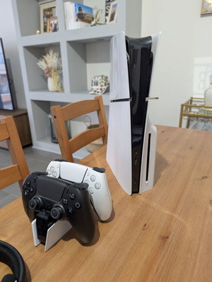 Sony PS5 Disk Edition console with 2 controllers, headphones, 5 games