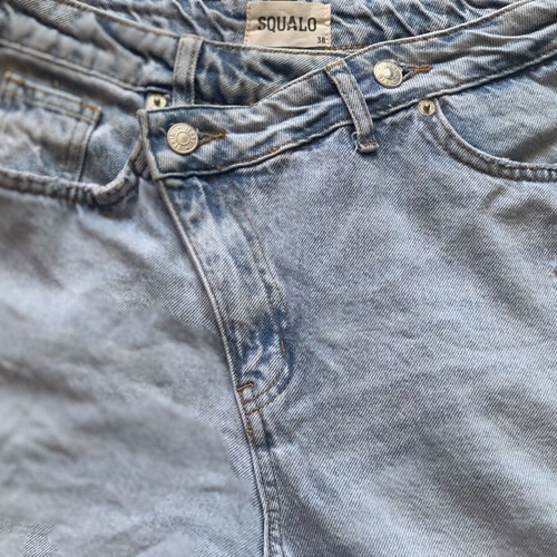 Jeans with asymmetrical buttoning like new, size M, blue