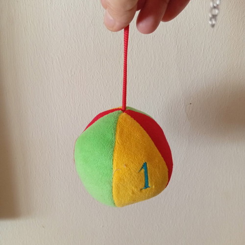 Hanging fabric ball toy