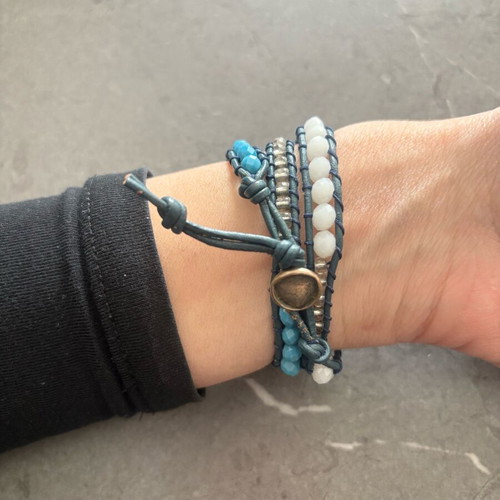 Leather bracelet like new with beads and blue evil eye detail