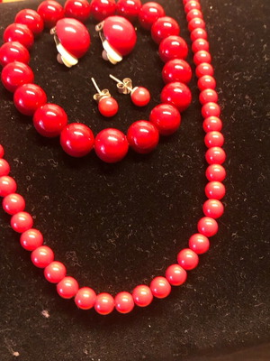 Jewelry set like new with red necklace, bracelet, and earrings