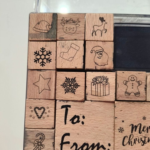 Craft set with wooden Christmas stamps used
