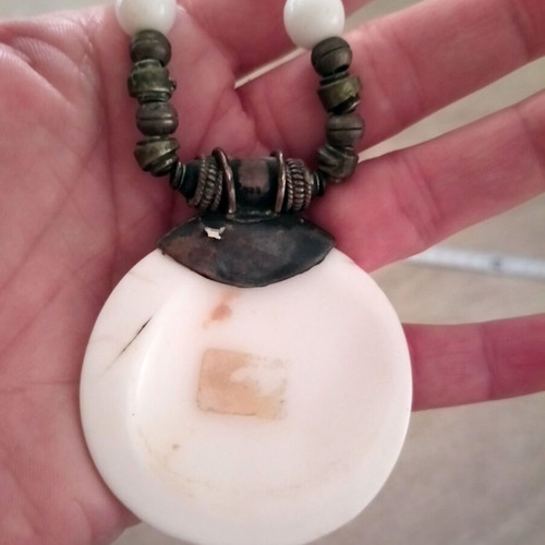 Handmade necklace with white pearls and bone charm used