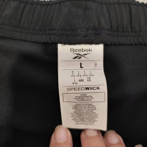 Reebok running shorts with integrated leggings like new, size L, black