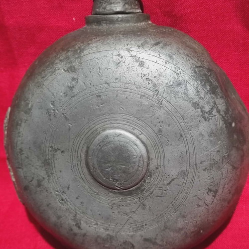 Collectible tin flask used (1870-1910)