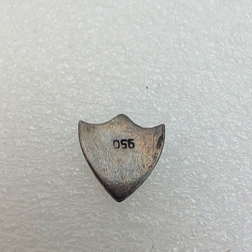 Silver 950 badge used with initials VG