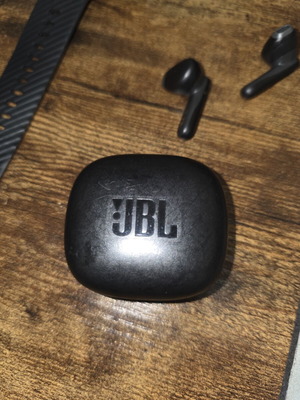 JBL Vibe Flex wireless earbuds with charging cable
