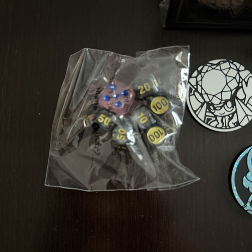 Pokémon Sleeves with Coins and Dice new from Pitch Black and Chaos Rising ETB