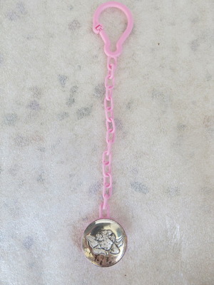 Pacifier clip used with pink plastic chain and angel charm