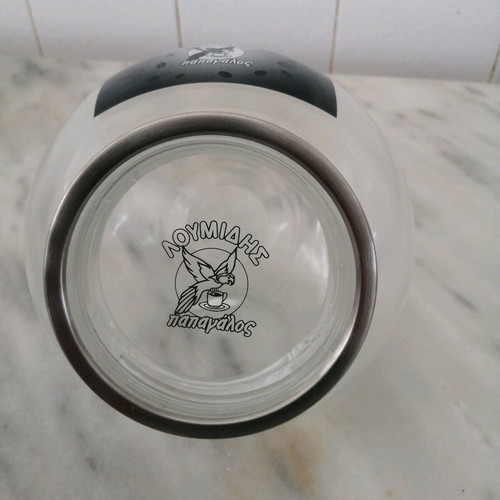 Collectible glass jar "Papagalos Loumidis" like new