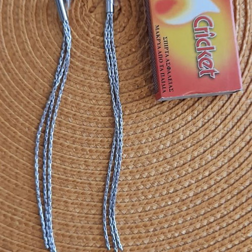 Stainless steel earrings like new, length 15 cm