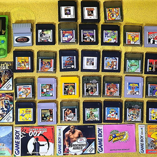 Gameboy Color used with 34 games, 7 manuals and Action Replay Pro