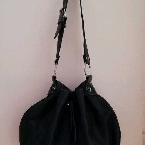 Leather shoulder bag like a pouch in like new condition, black