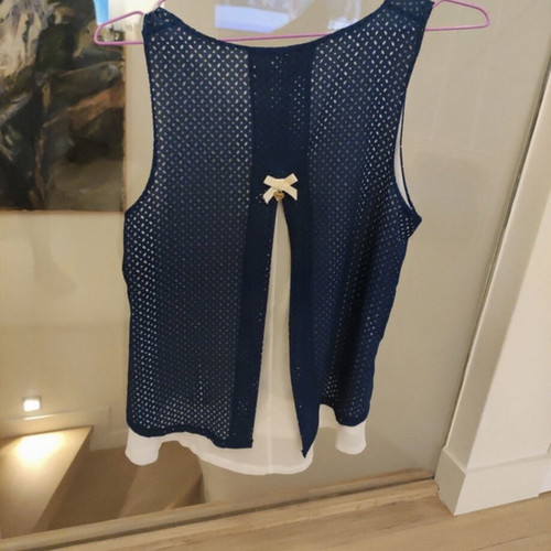 Matis top medium like new with lasercut design white and blue