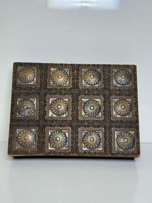Vintage wooden handmade jewelry box used with metal decorative elements