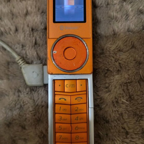 Samsung SGH-X830 used orange phone with charger