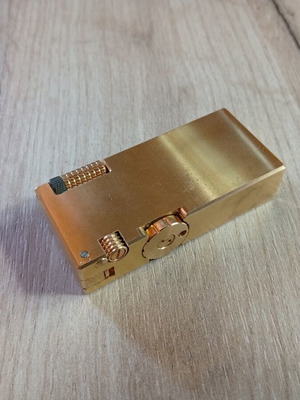 Vintage brass lighter used with flint storage for 4 stones