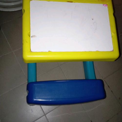 Desk used for child with board and storage space