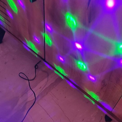 Party light used with Bluetooth, USB port, and built-in speaker