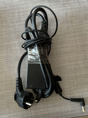 Delta Electronics AC/DC Adapter laptop charger used, model ADP-65JH DB