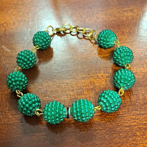 Earring and bracelet set like new, gold color with green bead