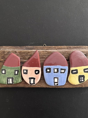 Handmade wall decor with clay houses on driftwood, new