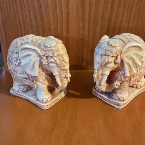 Pair of decorative elephants used with detailed embossed design