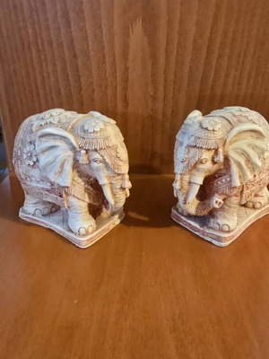 Pair of decorative elephants used with detailed embossed design