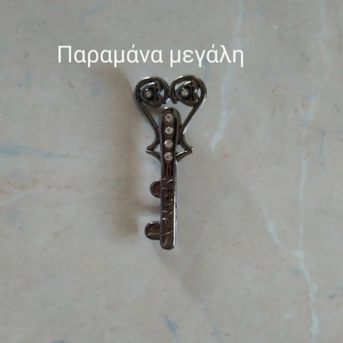Key-shaped safety pin like new
