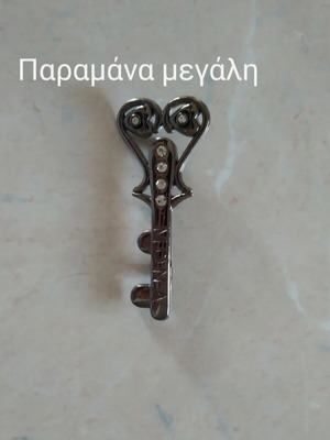 Key-shaped safety pin like new