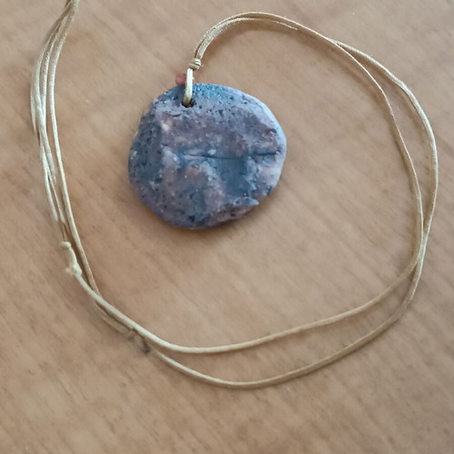 Ceramic handmade necklace like new with embossed dove and cord