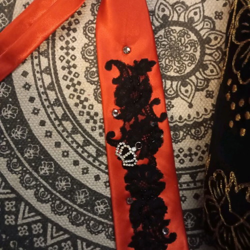 Red tie like new with pearls