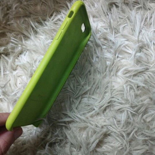 iPhone case used silicone pistachio with signs of wear