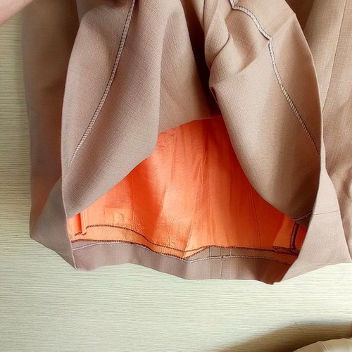 Skirts used, two beige tones, size 52, classic style