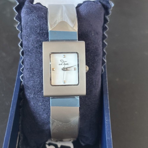 Women's Oskar de la Renta titanium watch completely new