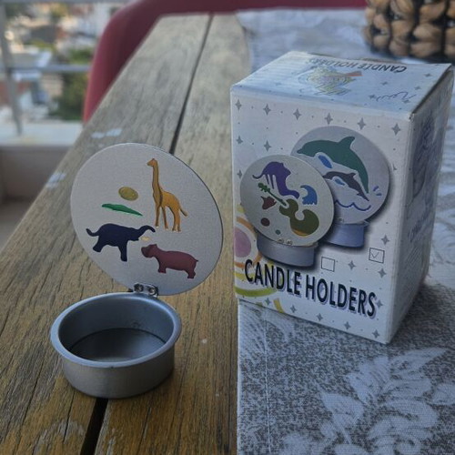 Metal tealight holder with stained glass animals